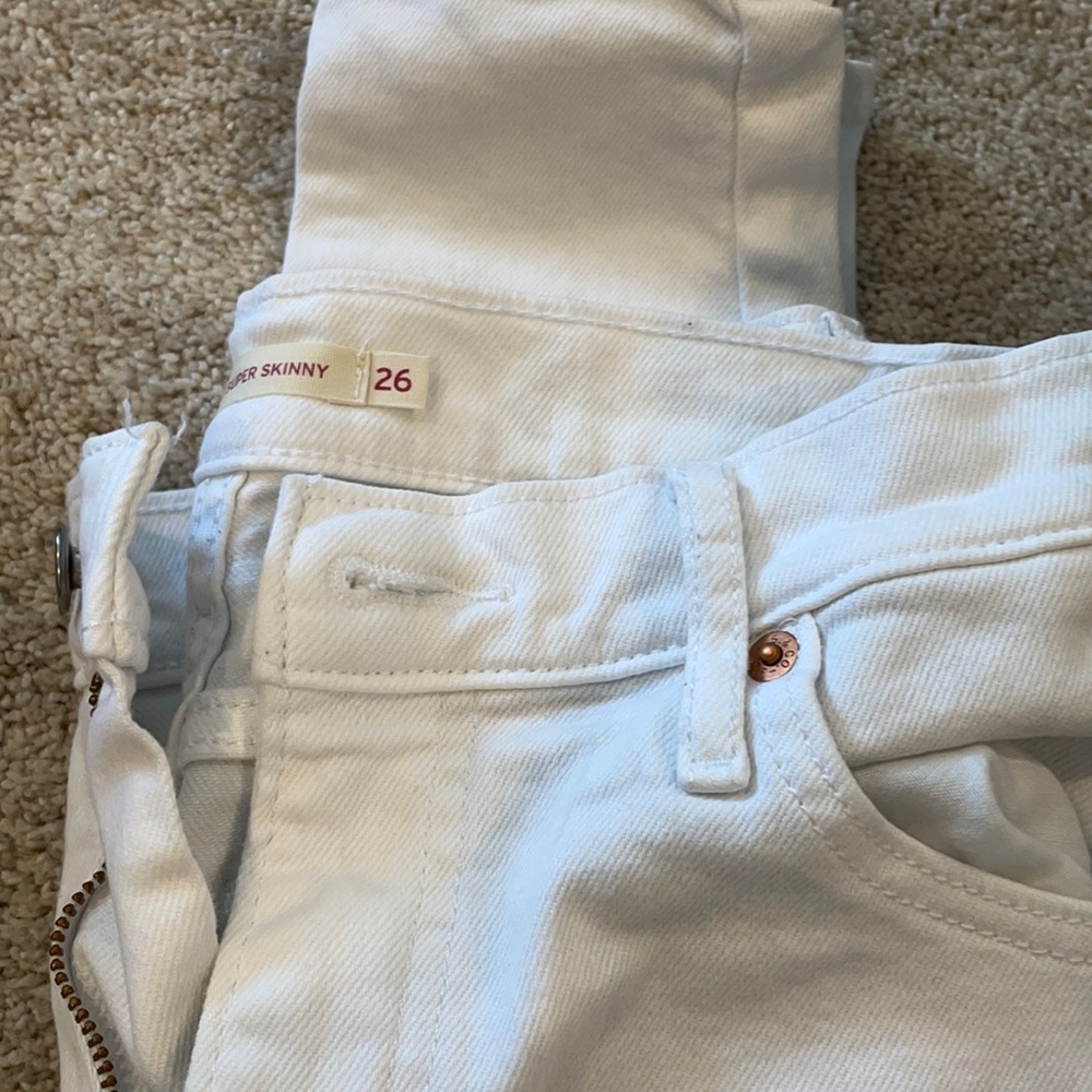 Mile high super skinny white Levi’s jeans